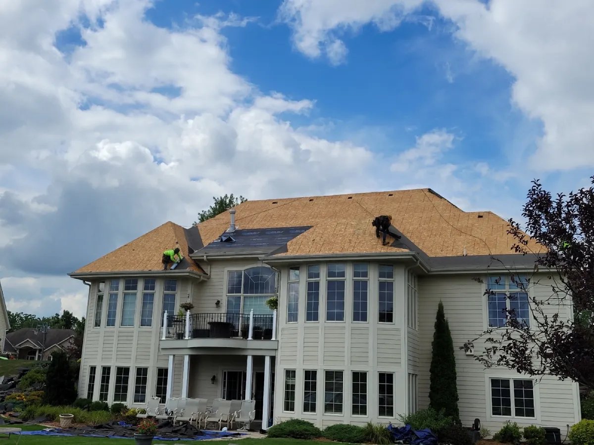 Large residential roof installation crew